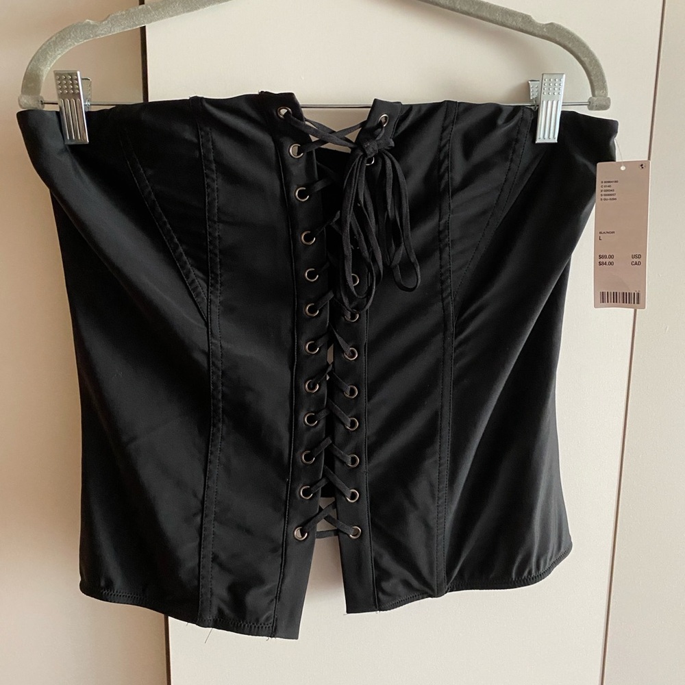 Urban Outfitters black corset 
Size L